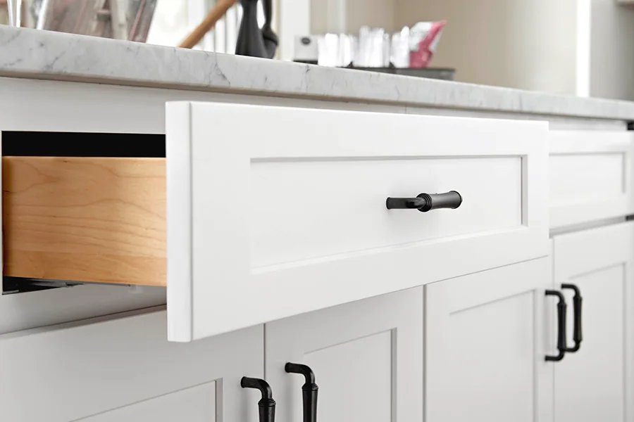 Open solid-wood drawer in white Timberland cabinetry