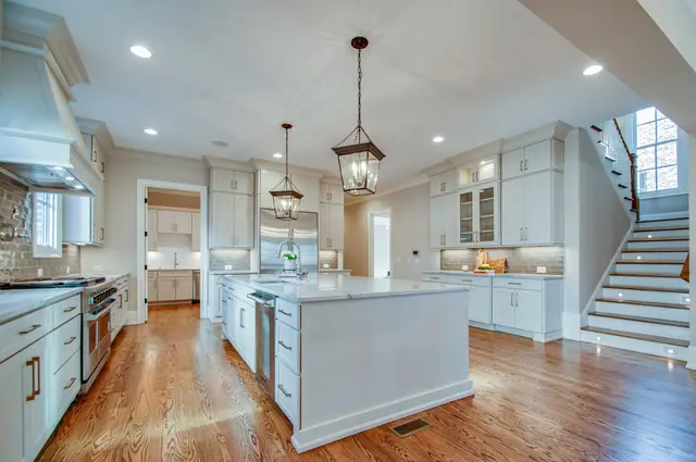 Wide view of an Oyster kitchen with a large island